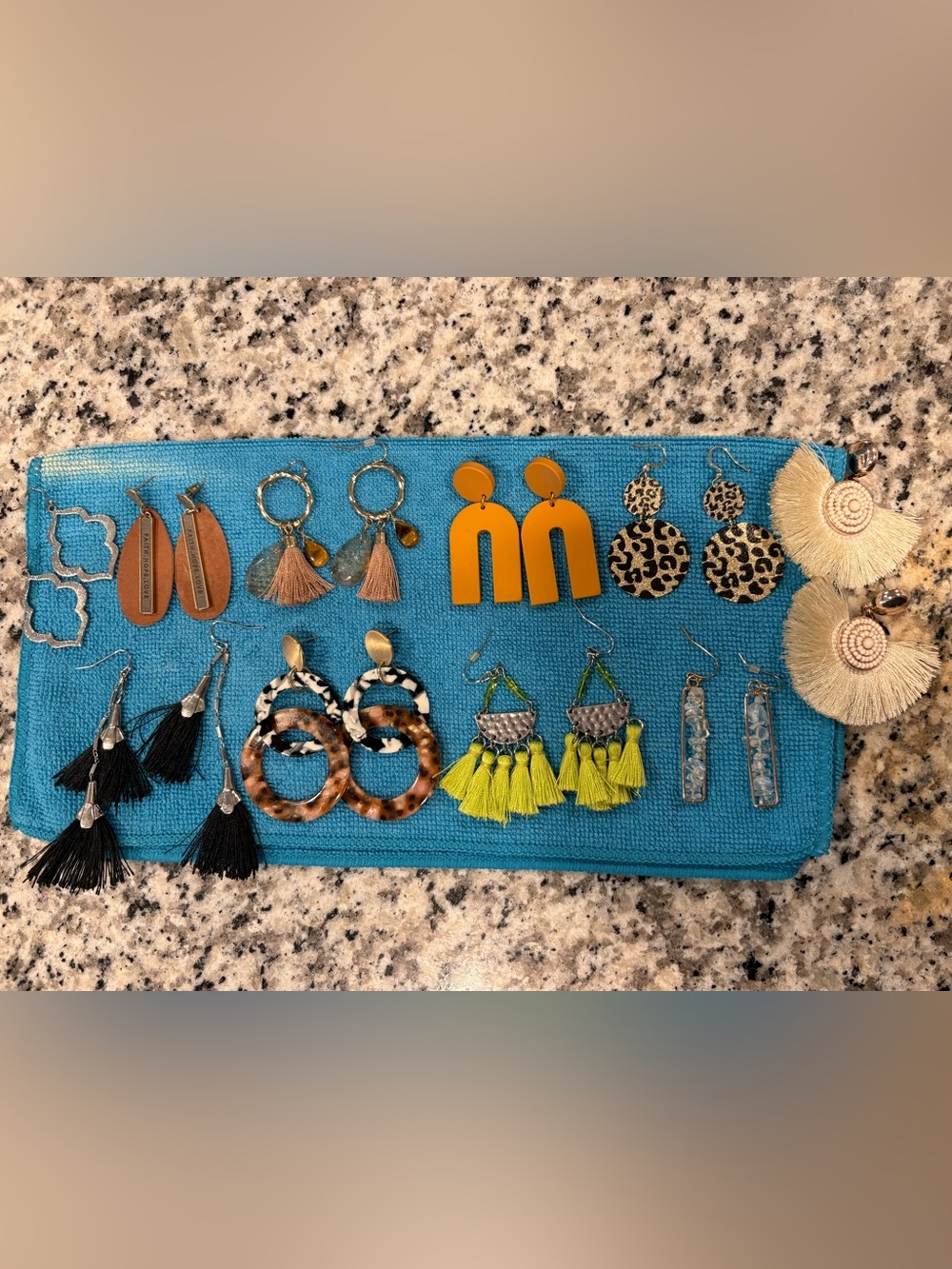 Assortment of colorful earrings.
